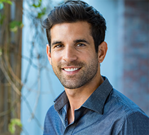 Headshot of man facing camera